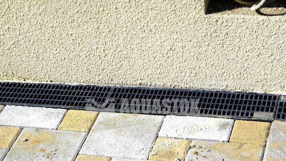 Лоток водоотводный пластиковый с решеткой AQUASTOK AQUA-TOP DN90 H100 класс A15