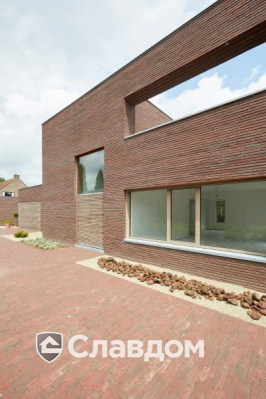 Частный дом в Дестелбергене с облицовкой кирпичом Terca Wasserstrich Special Rood