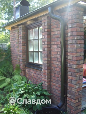 Коттедж с мансардой с облицовкой из кирпича Terca Kastanjebruin