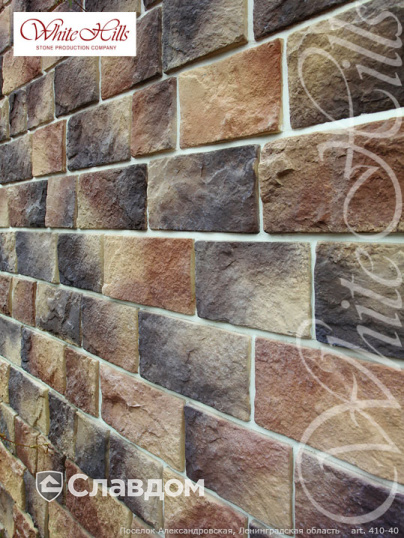 Поселок Александровская в Ленинградской области с использованием облицовочного камня White Hills Шинон 410-40