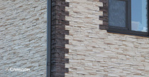 Облицовка двухэтажного дома искусственным камнем БАЛТФАСАД Корунд 038 и 049