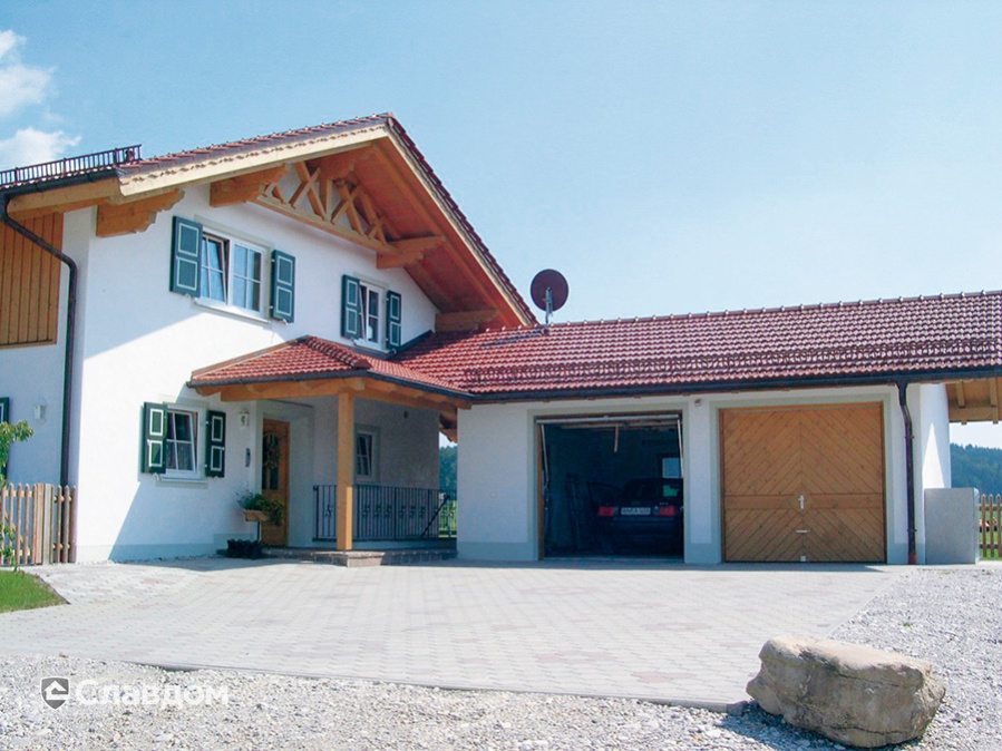 Двухэтажный частный дом с применением керамической черепицы Koramic Mondo 12 red engobe