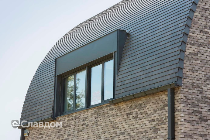 Офисное здание с применением керамической черепицы Koramic 301 Plain Tile Smooth Braised Blue