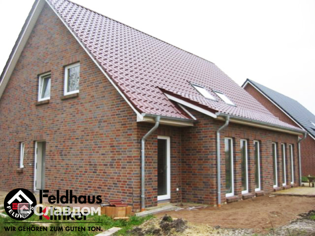 Двухэтажный частный дом с облицовкой кирпичом Feldhaus Klinker 661 sintra lava maris
