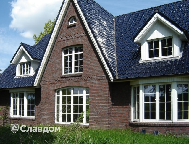 Дом с мансардой с облицовкой кирпичом Terca HKS Bunt