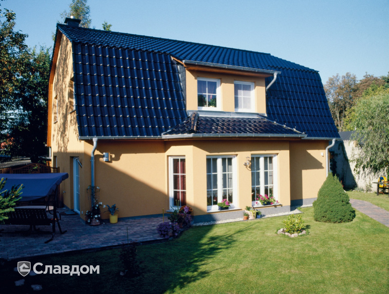Жилой дом с крышей из черепицы Creaton Futura Dunkelblau