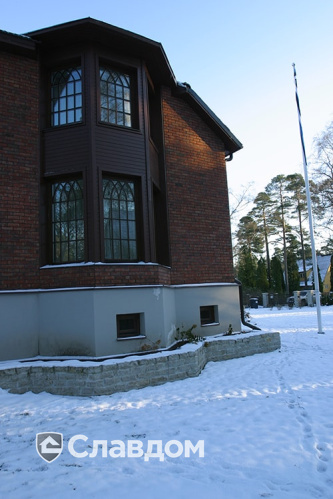 Коттедж с мансардой с облицовкой из кирпича Terca Kastanjebruin