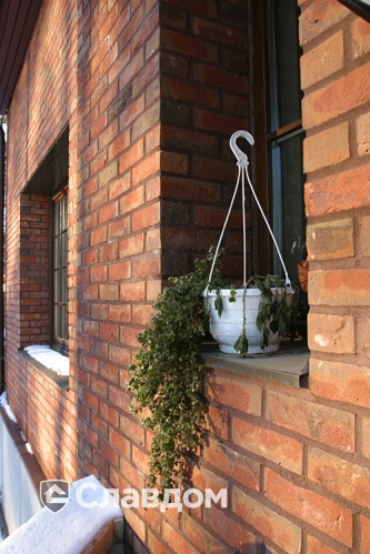 Коттедж с мансардой с облицовкой из кирпича Terca Kastanjebruin