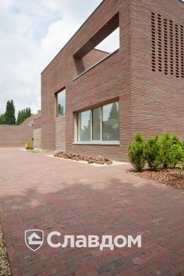 Частный дом в Дестелбергене с облицовкой кирпичом Terca Wasserstrich Special Rood