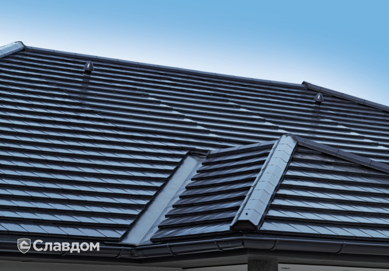 Крыша частного дома из черепицы Creaton Domino Schwarz Glasiert