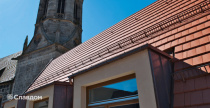Здание церкви с крышей из черепицы Creaton Domino Naturrot