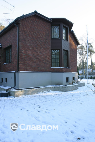 Коттедж с мансардой с облицовкой из кирпича Terca Kastanjebruin