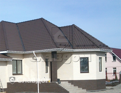 Коттедж с использованием керамической черепицы BRAAS