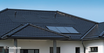 Крыша частного дома из черепицы Creaton Domino Schwarz Glasiert