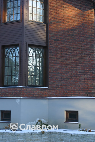 Коттедж с мансардой с облицовкой из кирпича Terca Kastanjebruin