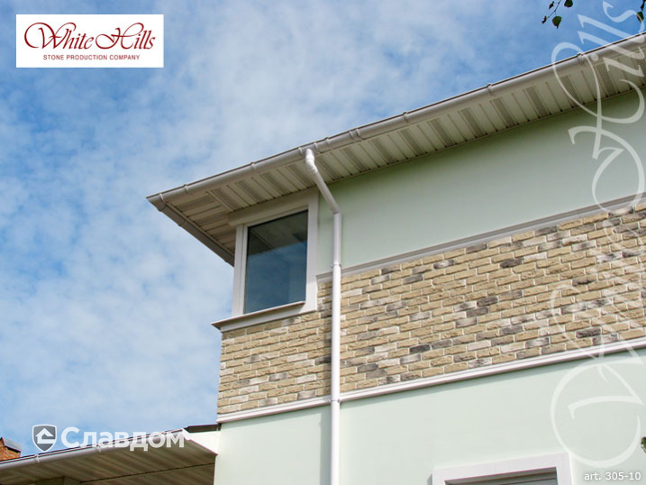 Фасад частного дома с применением облицовочного камня White Hills Бремен брик 305-10