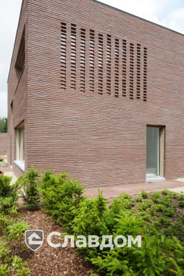 Частный дом в Дестелбергене с облицовкой кирпичом Terca Wasserstrich Special Rood