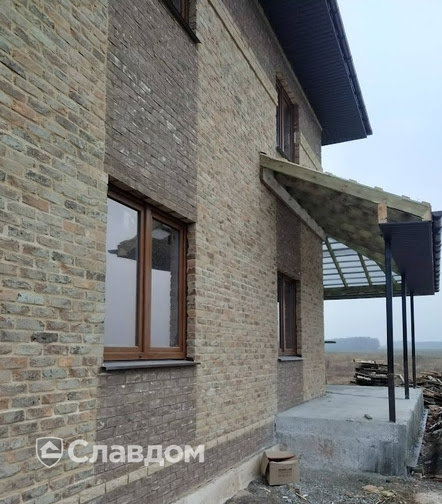 Загородный дом, облицованный кирпичом Сафоново Клинкер №20