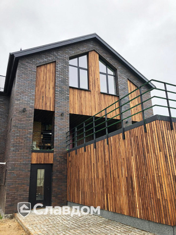 Загородный дом с облицовкой кирпичом MUHR 33 A Schwarz-Braun