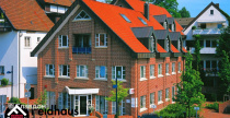 Отель с облицовкой кирпичом Feldhaus Klinker 400 carmesi liso