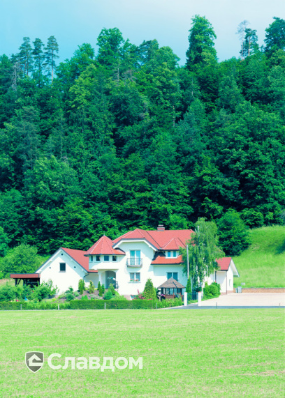 Дом с интересным дизайном крыши из черепицы Creaton Biber Klassik Kupferrot engobiert