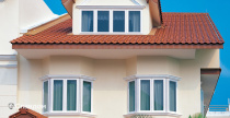 Дом в колониальном стиле с крышей из черепицы Creaton Harmonie Naturrot