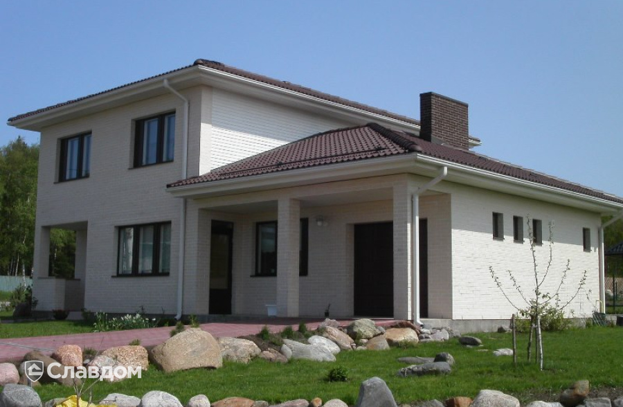 Частный дом с облицовкой кирпичом Terca Kuura гладкий