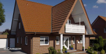 Частный дом с облицовкой кирпичом Feldhaus Klinker 400 carmesi liso