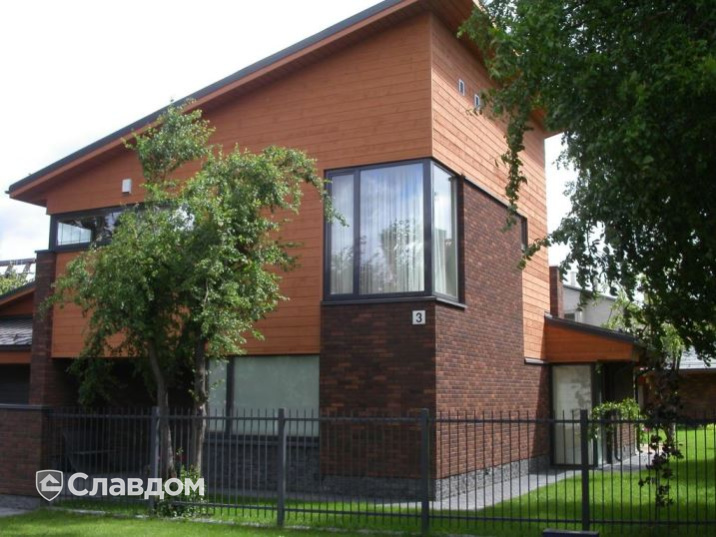 Двухэтажный дом с облицовкой кирпичом Terca Terra шероховатый