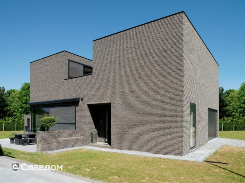 Частный дом в г.Ас с облицовкой кирпичом Terca Titaangrijs