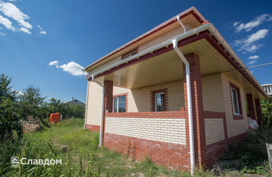 Частный дом с облицовкой из кирпича Керамейя жемчуг