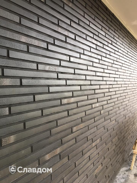 Частный дом с облицовкой фасадной плиткой Stroeher Riegel 50 456