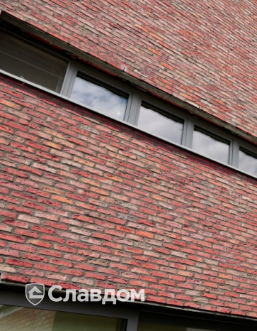 Частный дом в Экло с облицовкой кирпичом Terca Paarsblauw