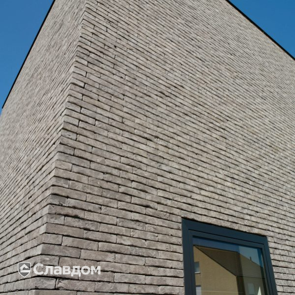 Частный дом в г.Ас с облицовкой кирпичом Terca Titaangrijs