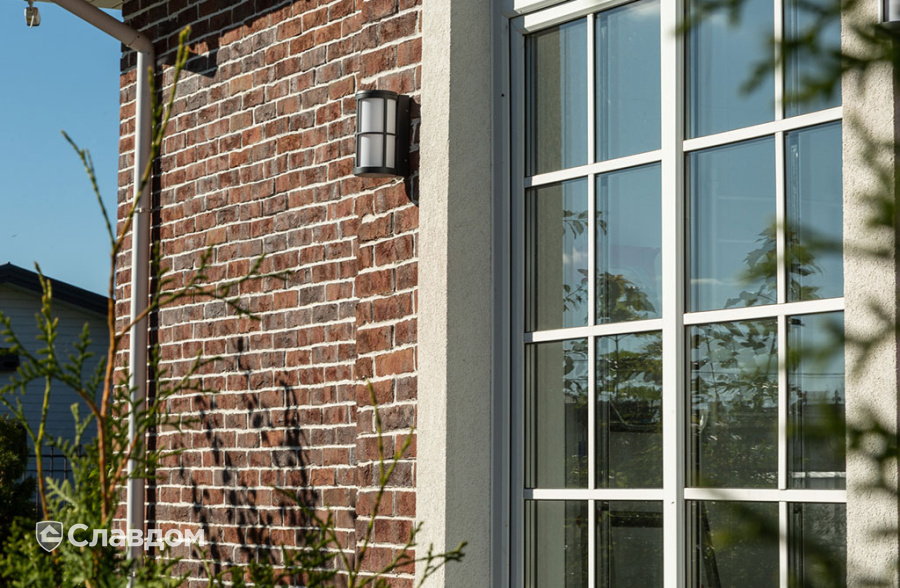 Частный дом с облицовкой плиткой Roben Formback Buntgeflammt