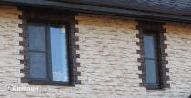 Облицовка двухэтажного дома искусственным камнем БАЛТФАСАД Корунд 038 и 049