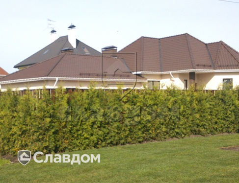 Коттедж с использованием керамической черепицы BRAAS