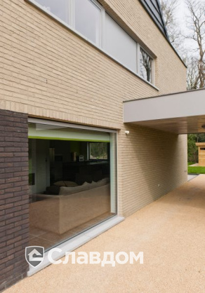 Частный дом с облицовкой кирпичом Terca Ombra и Prata