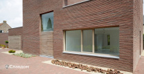Частный дом в Дестелбергене с облицовкой кирпичом Terca Wasserstrich Special Rood