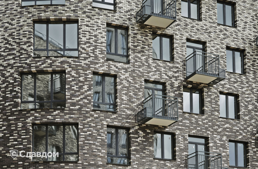 Жилой район с облицовкой кирпичом Roben Oslo perlweiss, Faro grau, Faro schwarz-nuanciert, Chelsea basalt-bunt, Manchester