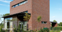 Частный дом в Экло с облицовкой кирпичом Terca Paarsblauw