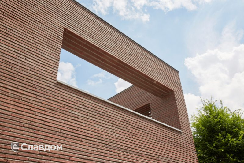 Частный дом в Дестелбергене с облицовкой кирпичом Terca Wasserstrich Special Rood