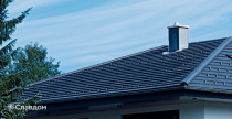 Дом в лесу с крышей из черепицы Creaton Domino Schieferton Engobiert