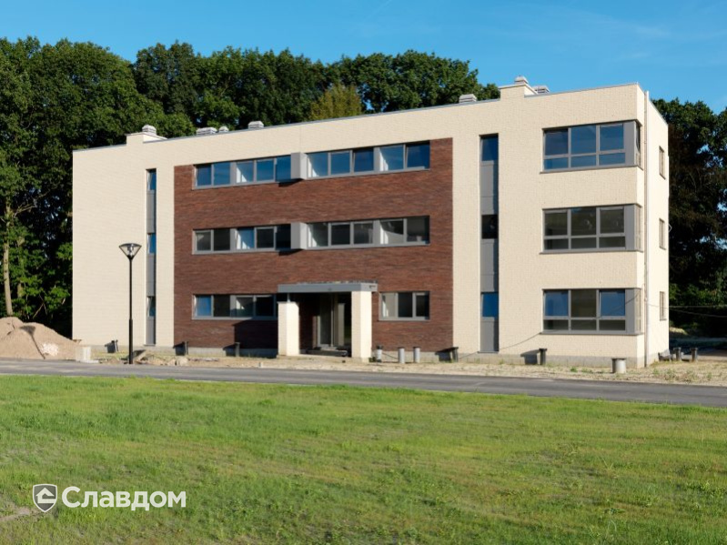 Жилой дом в Схотене с облицовкой кирпичом Terca Wasserstrich Special Rood