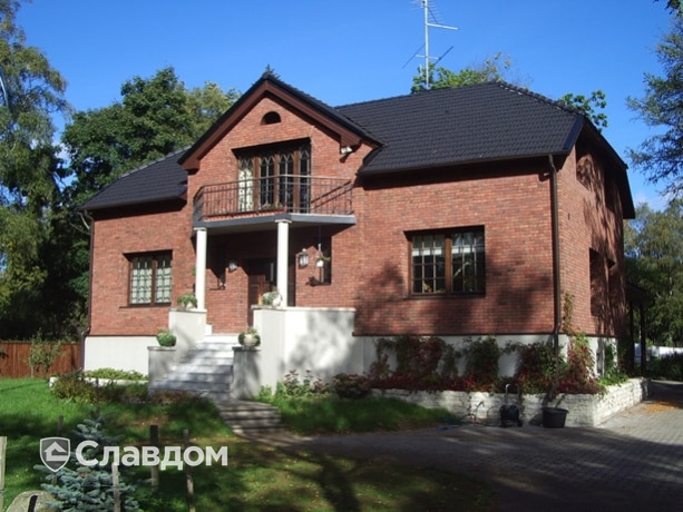 Коттедж с мансардой с облицовкой из кирпича Terca Kastanjebruin