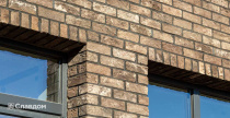 Частный дом с облицовкой из кирпича Тандем Данилово