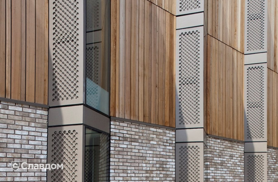 Трехэтажный жилой дом с облицовкой кирпичом Terca Bronsgroen