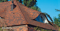 Частный дом с крышей из черепицы Creaton Biber Klassik Naturrot geflammt engobiert