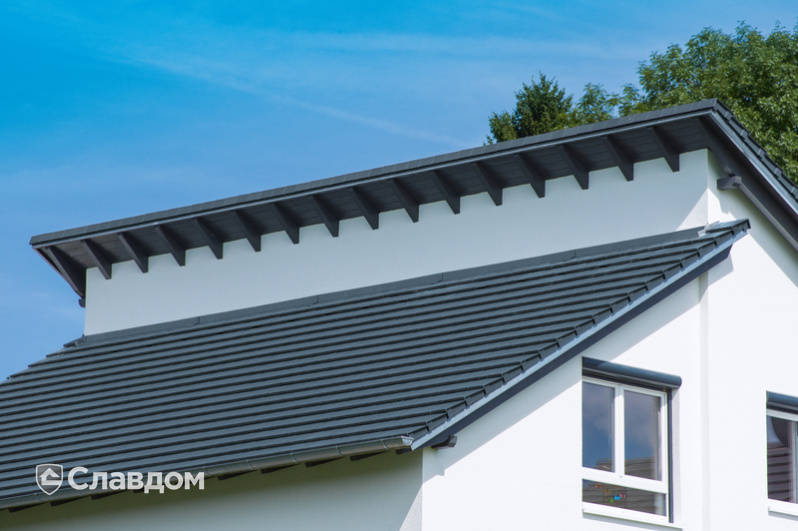 Дом в коттеджном поселке с крышей из черепицы Creaton Domino Schieferton Engobiert