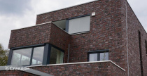 Жилой дом с облицовкой кирпичом Terca Rosslau